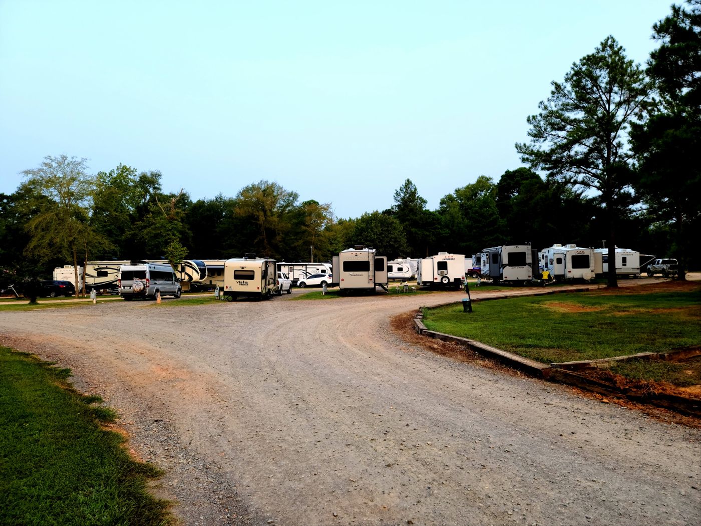 Curving gravel road past the RV row